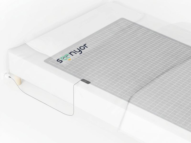 Bed Guardian smart monitoring pad on a bed